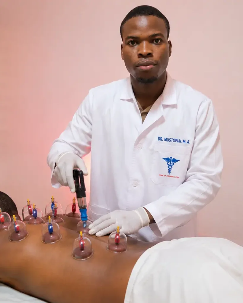 Dr Mustopha treating patient